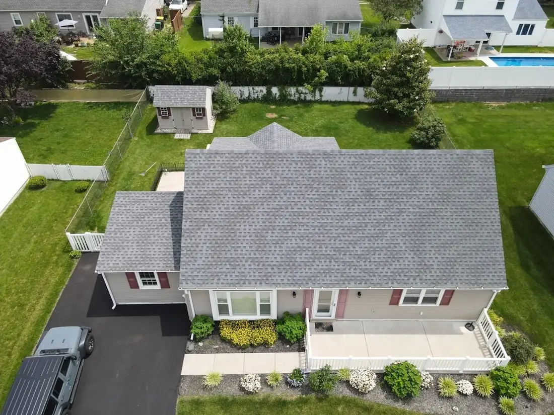 iRoofer crew installing architectural shingles on a Georgia home in Dallas